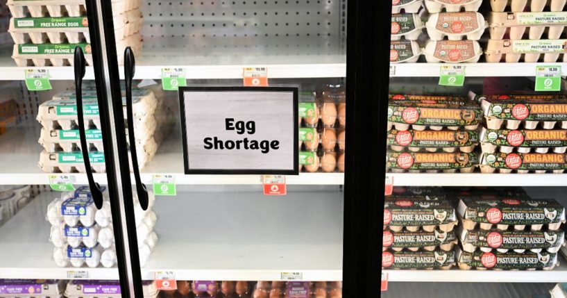 Egg shortage signage is displayed on partially empty shelves at a Sprouts Farmer's Market grocery store in Lawndale, California on January 2, 2025. Bird flu and other factors have contributed to an egg shortage in California.