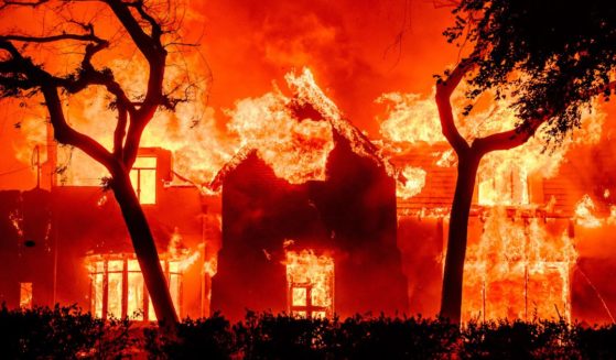 A home is engulfed in flames during the Eaton fire in the Altadena area of Los Angeles County, California on January 8, 2025.