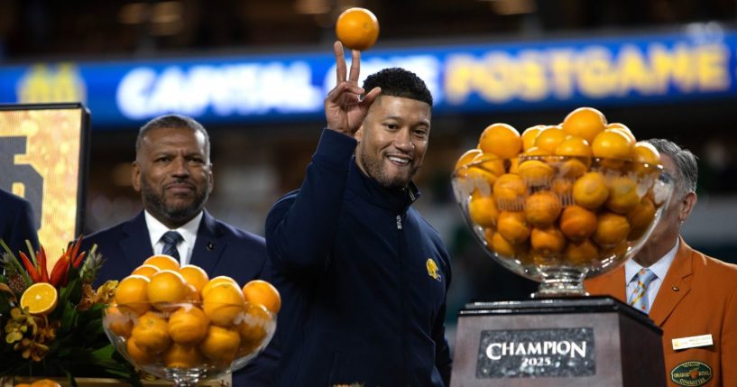 Notre Dame Fighting Irish Head Coach Marcus Freeman celebrates with his team after winning the game against Penn State Nittany Lions at Hard Rock Stadium on January 9, 2025 in Miami Gardens, Florida.