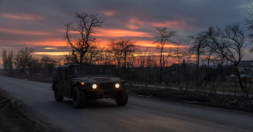 A Ukrainian serviceman drives a US-made Humvee on a road that leads to the town of Chasiv Yar, in the Donetsk region, on March 30, 2024, amid the Russian invasion of Ukraine.