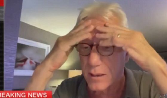 Actor James Woods is visibly choked up during an interview with CNN on Wednesday.