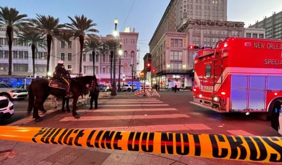 Police cordon off the intersection of Canal Street and Bourbon Street in the French Quarter of New Orleans, Louisiana, on January 1, 2025. At least 10 people were killed and 30 injured Wednesday when a vehicle plowed overnight into a New year's crowd in the heart of the thriving New Orleans tourist district, authorities in the southern US city said.