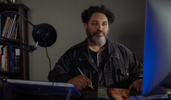 Darrin Bell, Pulitzer winning editorial Cartoonist and comic strip creator, poses for a portrait at his office in Sacramento, Calif. on June 2, 2023.