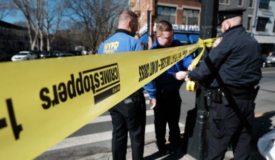 Police investigate at an intersection after a man driving a U-Haul truck struck several pedestrians in the Bay Ridge neighborhood in Brooklyn on February 13, 2023 in New York City.