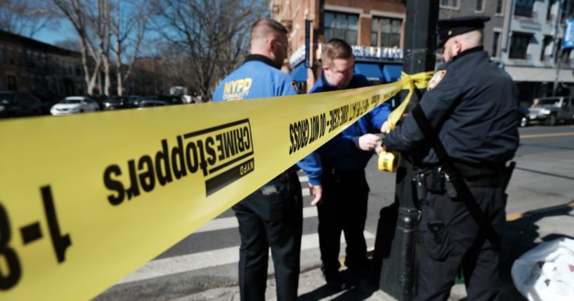 Police investigate at an intersection after a man driving a U-Haul truck struck several pedestrians in the Bay Ridge neighborhood in Brooklyn on February 13, 2023 in New York City.