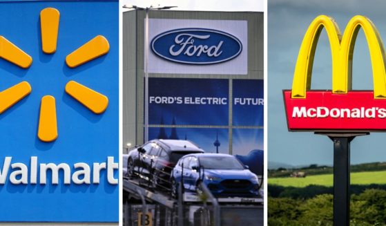 (L) The company logo is shown on the front of the building at a Walmart store on May 18, 2023 in Chicago, Illinois. (C) Cars of US car manufacturer Ford car stand on a lorry transporter in front of their logo at the Ford plant in Cologne, western Germany, on November 25, 2024. (R) The sun shines on the yellow Golden Arches logo of the fast food restaurant McDonald's near Saint Austell, on August 14, 2024 in Cornwall, England.