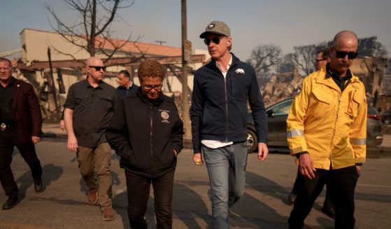 California Governor Gavin Newsom and Los Angeles Mayor Karen Bass tour the downtown business district of Pacific Palisades as the Palisades Fire continues to burn on January 8, 2025 in Los Angeles, California.