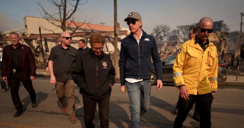 California Governor Gavin Newsom and Los Angeles Mayor Karen Bass tour the downtown business district of Pacific Palisades as the Palisades Fire continues to burn on January 8, 2025 in Los Angeles, California.