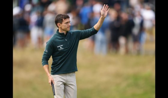 Tom Holland acknowledges the crowd on the 14th green during the Pro-Am prior to the BMW PGA Championship 2024 at Wentworth Club on September 18, 2024 in Virginia Water, England.