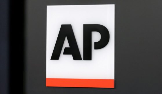 The Associated Press logo is displayed at the company's headquarters in New York on April 18, 2017.