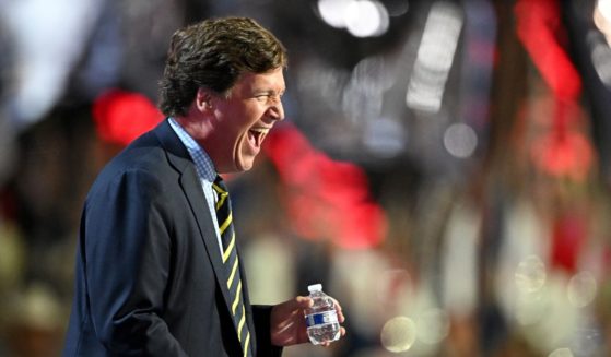 Tucker Carlson, founder of Tucker Carlson Network, arrives to speak on stage on the fourth day of the Republican National Convention at the Fiserv Forum on July 18, 2024, in Milwaukee, Wisconsin.