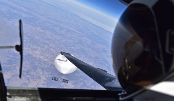 A U.S. Air Force U-2 pilot looks down at the suspected Chinese surveillance balloon as it hovers over the Central Continental United States on Feb. 3, 2023.