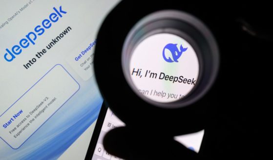 The Deepseek logo is seen through a magnifying loupe while displayed on a mobile phone screen in London, England, on Jan. 29.