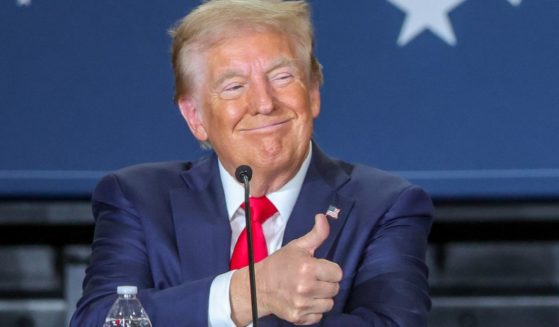 Then-Republican presidential nominee Donald Trump gives a thumbs up during a Hispanic roundtable at Beauty Society in Las Vegas, Nevada, on Oct. 12.