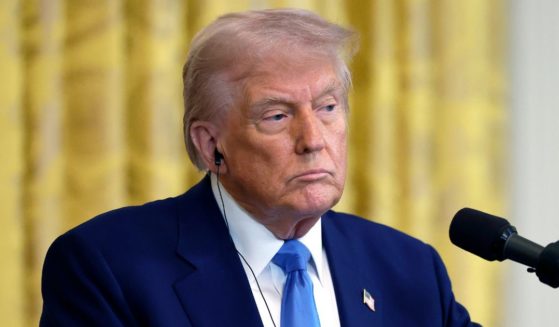 President Donald Trump delivers remarks during a joint news conference with French President Emmanuel Macron in the East Room at the White House in Washington, D.C., on Monday.