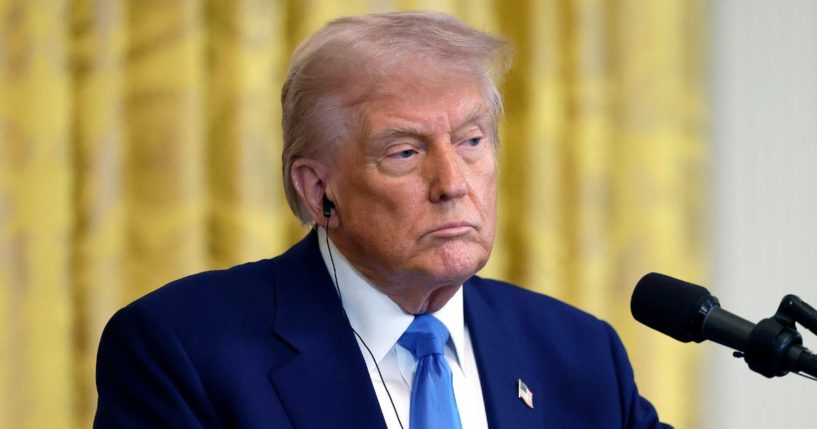 President Donald Trump delivers remarks during a joint news conference with French President Emmanuel Macron in the East Room at the White House in Washington, D.C., on Monday.