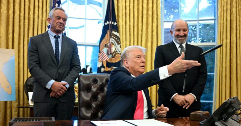 President Donald Trump throws a sharpie after signing an executive order at the Oval Office of the White House in Washington, D.C., on Tuesday.