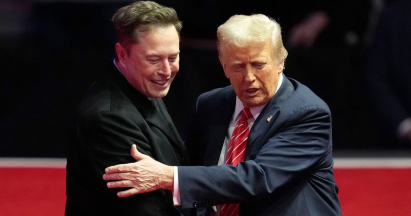 Elon Musk, left, and President-elect Donald Trump embrace at a rally ahead of the 60th Presidential Inauguration in Washington, D.C., on Jan. 19.