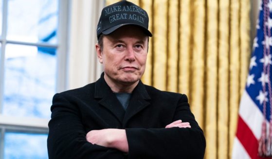 Elon Musk speaks with President Donald Trump and reporters in the Oval Office of the White House in Washington, D.C., on Tuesday.