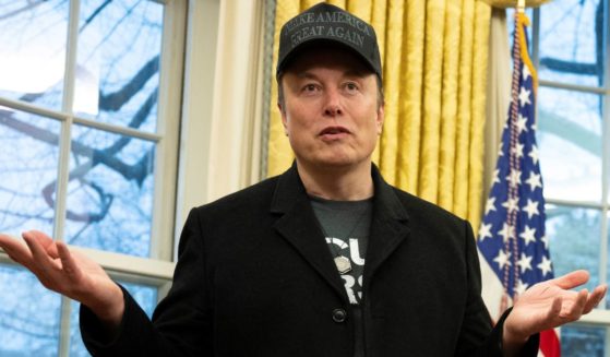 Elon Musk speaks to reporters from the Oval Office at the White House in Washington, D.C., on Tuesday.