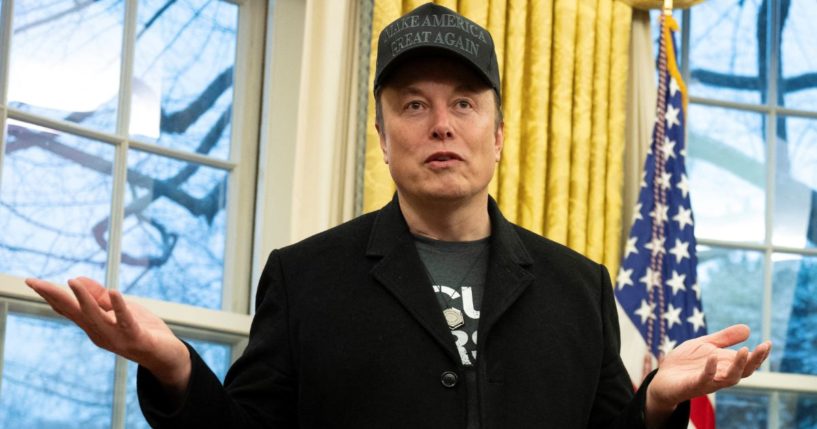 Elon Musk speaks to reporters from the Oval Office at the White House in Washington, D.C., on Tuesday.