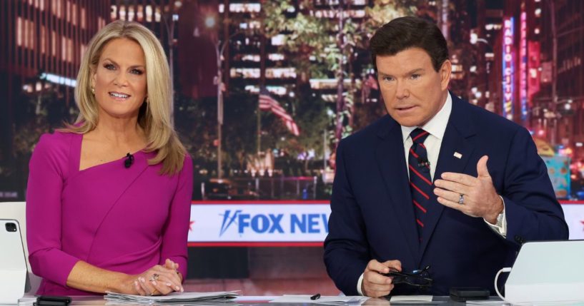 Hosts Martha MacCallum, left, and Bret Baier, are seen during Fox News' Election Day coverage Nov. 5. Recent ratings indicate Fox has been trouncing the competition -- including among Democrats and independents.