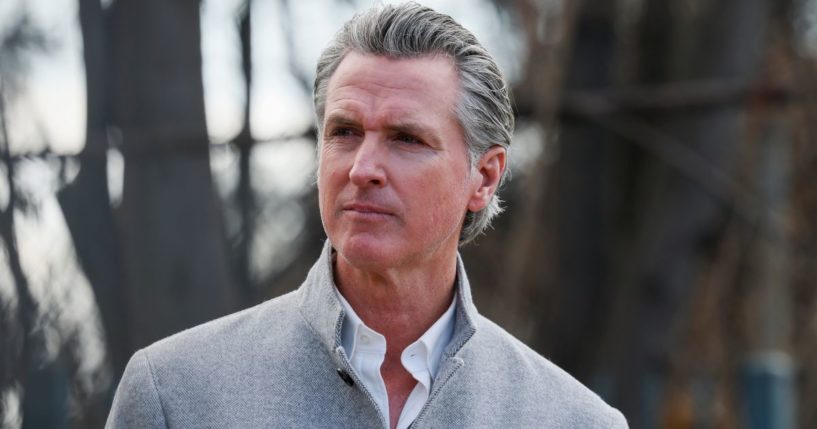 Gov. Gavin Newsom attends a news conference at Odyssey Charter School in Altadena, California, on Tuesday.