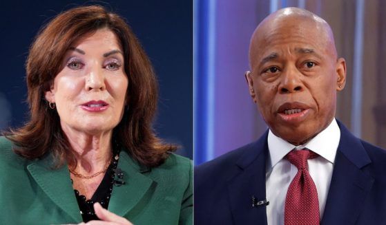 New York Gov. Kathy Hochul, left, has the power to remove officials from office, and she has indicated she is thinking about removing New York City Mayor Eric Adams, right, from his position after the Department of Justice dropped charges against him without prejudice.