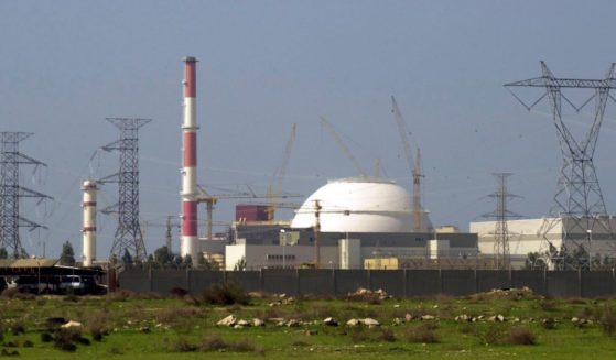 The reactor building of Iran's nuclear power plant and electricity poles are seen in Bushehr, Iran, on Feb. 27, 2005.