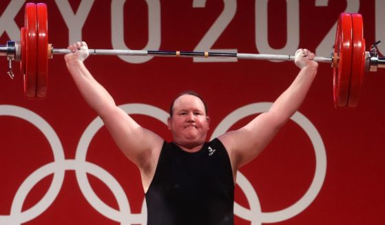 Laurel Hubbard, a man competing as a women on Team New Zealand, competes during the Weightlifting - Women's 87kg+ Group A on day ten of the Tokyo 2020 Olympic Games in Tokyo, Japan, on Aug. 2, 2021.