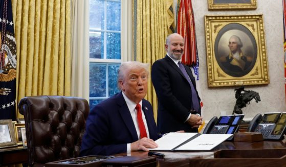 President Donald Trump speaks with reporters in the Oval Office of the White House on Feb. 3, 2025 in Washington.