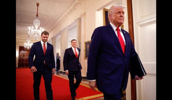 President Donald Trump walks in the East Room of the White House in Washington on Feb. 3, 2025.