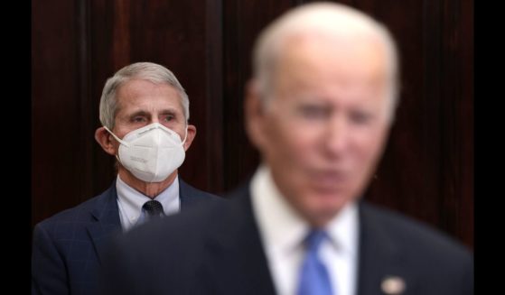 Then-President Joe Biden and former Director of the National Institute of Allergy and Infectious Diseases Anthony Fauci stand in the White House on Nov. 29, 2021 in Washington.