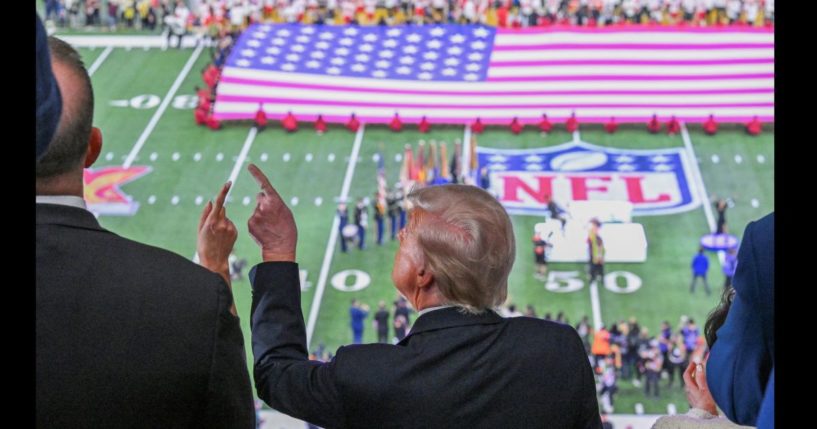 President Donald Trump points up at Super Bowl LIX in New Orleans on Feb. 9, 2025.