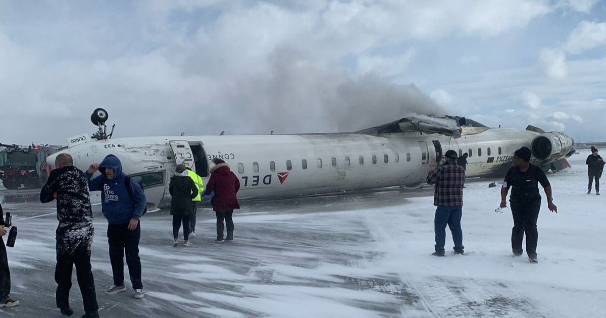 Stunning Footage: Delta Plane Ends Up Completely Upside Down After Crash Landing