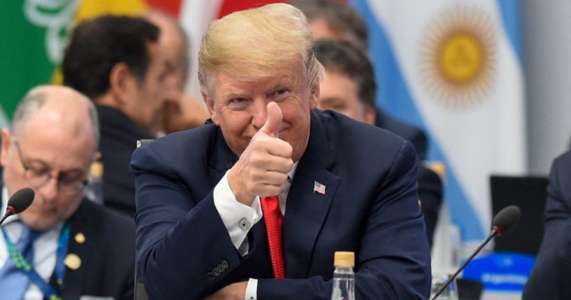 A smiling President Donald Trump gives a thumbs up at the G20 Leaders' Summit in Buenos Aires, on Nov. 30, 2018.