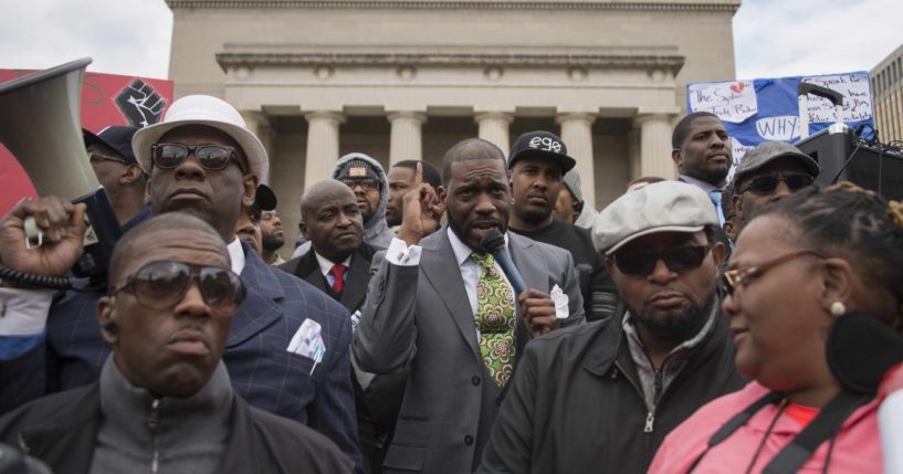 Pastor Jamal Harrison Bryant gathered with other left-wing protesters outside of City Hall in Baltimore, Maryland, on April 13, 2015.