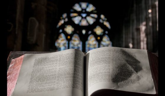 A Bible sits on the pulpit in a church.