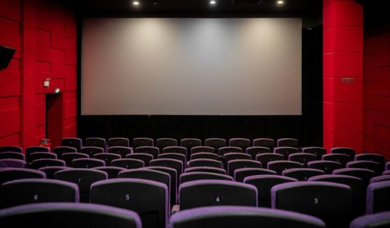 This stock image shows an empty movie theater.