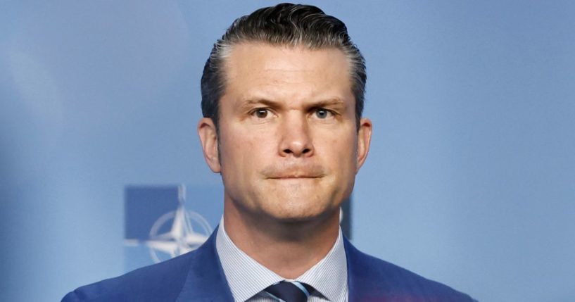 Defense Secretary Pete Hegseth reacts prior to The North Atlantic Treaty Organisation Ministers of Defence meeting at NATO Headquarters in Brussels, Belgium, on Thursday.