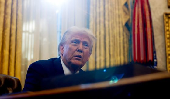 U.S. President Donald Trump speaks with reporters in the Oval Office of the White House on February 04, 2025 in Washington, DC.