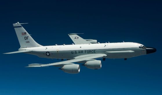 A RC-135V Rivet Joint flies high over the Midwest on a training mission out of Offutt Air Force Base, Nebraska.