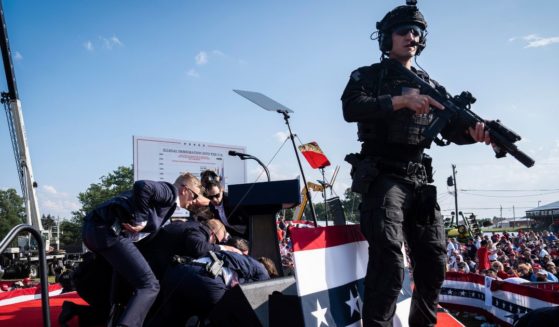 Secret Service agents and the counter assault team react moments after shots were fired toward then-Republican presidential candidate Donald Trump in Butler, Pennsylvania, on July 13.