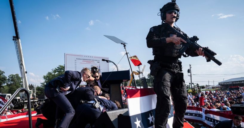 Secret Service agents and the counter assault team react moments after shots were fired toward then-Republican presidential candidate Donald Trump in Butler, Pennsylvania, on July 13.