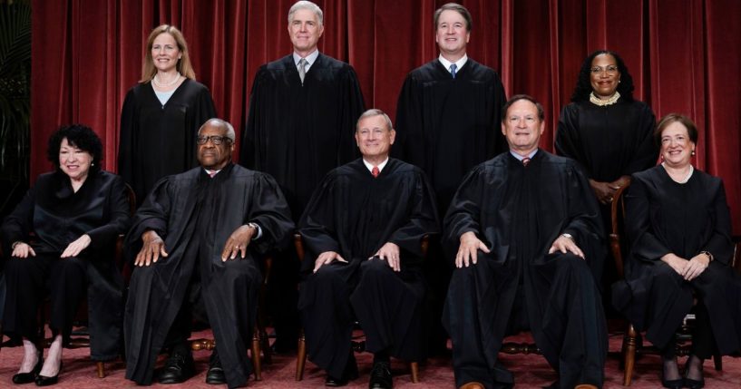 Members of the Supreme Court sit for a new group portrait following the addition of Associate Justice Ketanji Brown Jackson, at the Supreme Court building in Washington, D.C., on Oct. 7, 2022.