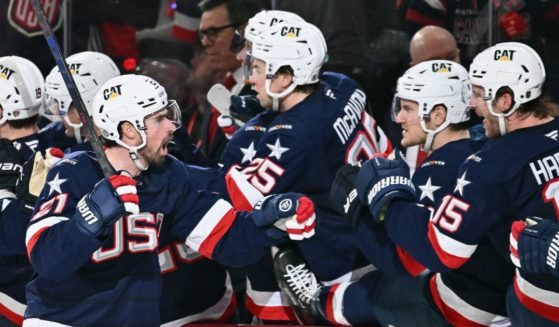 Dylan Larkin, left, of Team USA celebrates his goal against Team Canada at 13:33 of the second period in the 4 Nations Face-Off game in Montreal, Quebec, Canada, on Saturday.