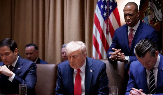 Secretary of Housing and Urban Development Scott Turner leads a prayer during a Cabinet meeting at the White House on Feb. 26, 2025, in Washington, D.C.