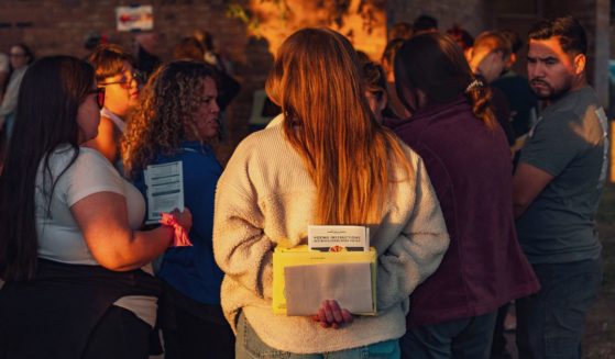 Voters line up to vote in person at the Fowler School polling station in Tempe, Arizona, on Election Day, Nov. 5.