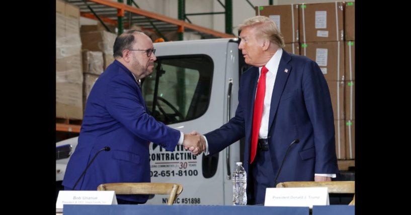 Goya President and CEO Robert Unanue (L) greets U.S. President Donald Trump during a Hispanic roundtable at Beauty Society on October 12, 2024 in North Las Vegas, Nevada.