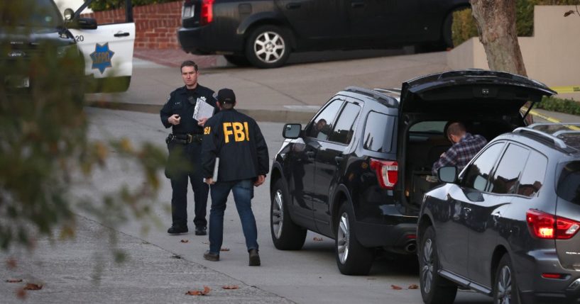 San Francisco police officers and F.B.I. agents gather in front of the home of U.S. Speaker of the House Nancy Pelosi (D-CA) on October 28, 2022 in San Francisco, California.